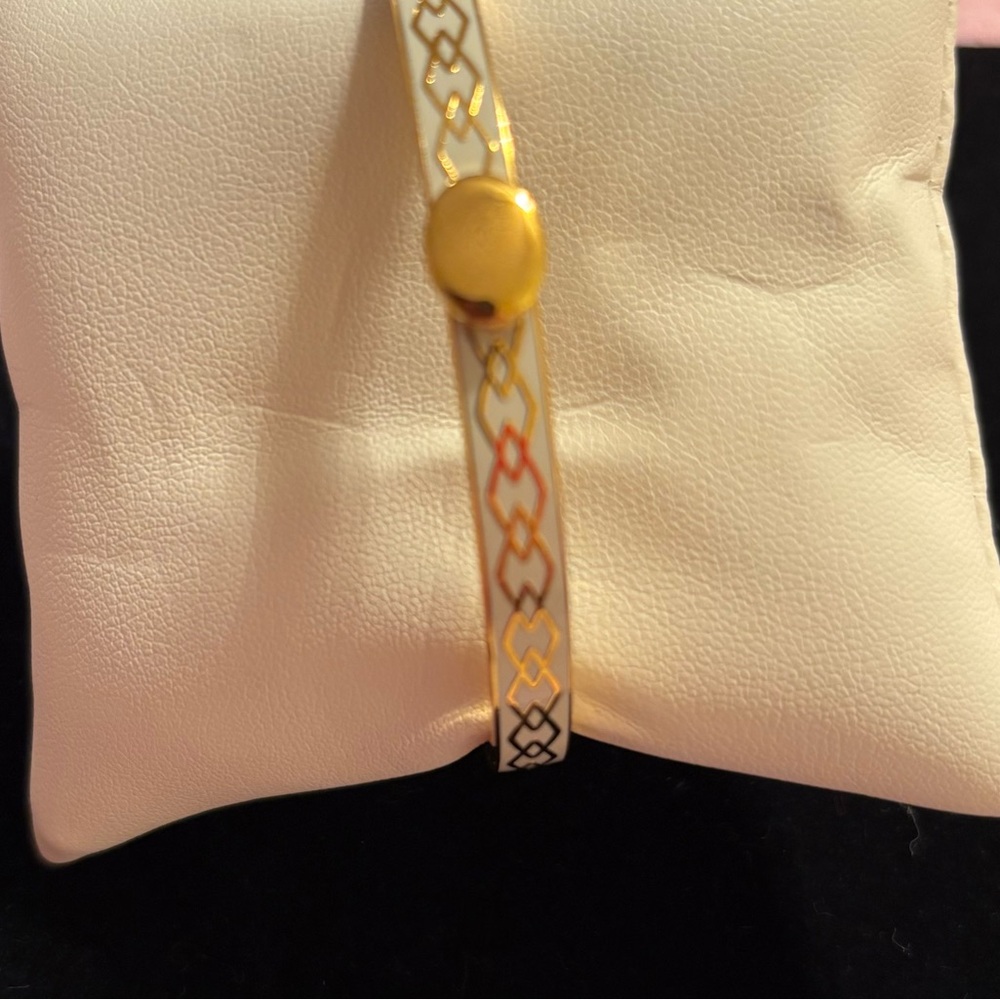 Gold and White Bracelet with Intricate Design